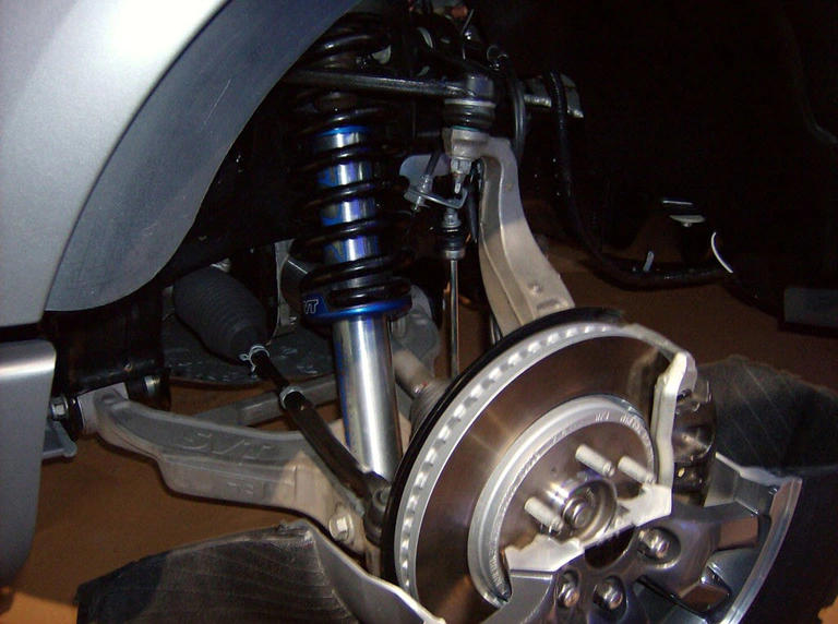 What are the benefits of modifying the shock absorber?